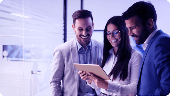 Employees Conducting Performance Review In Office