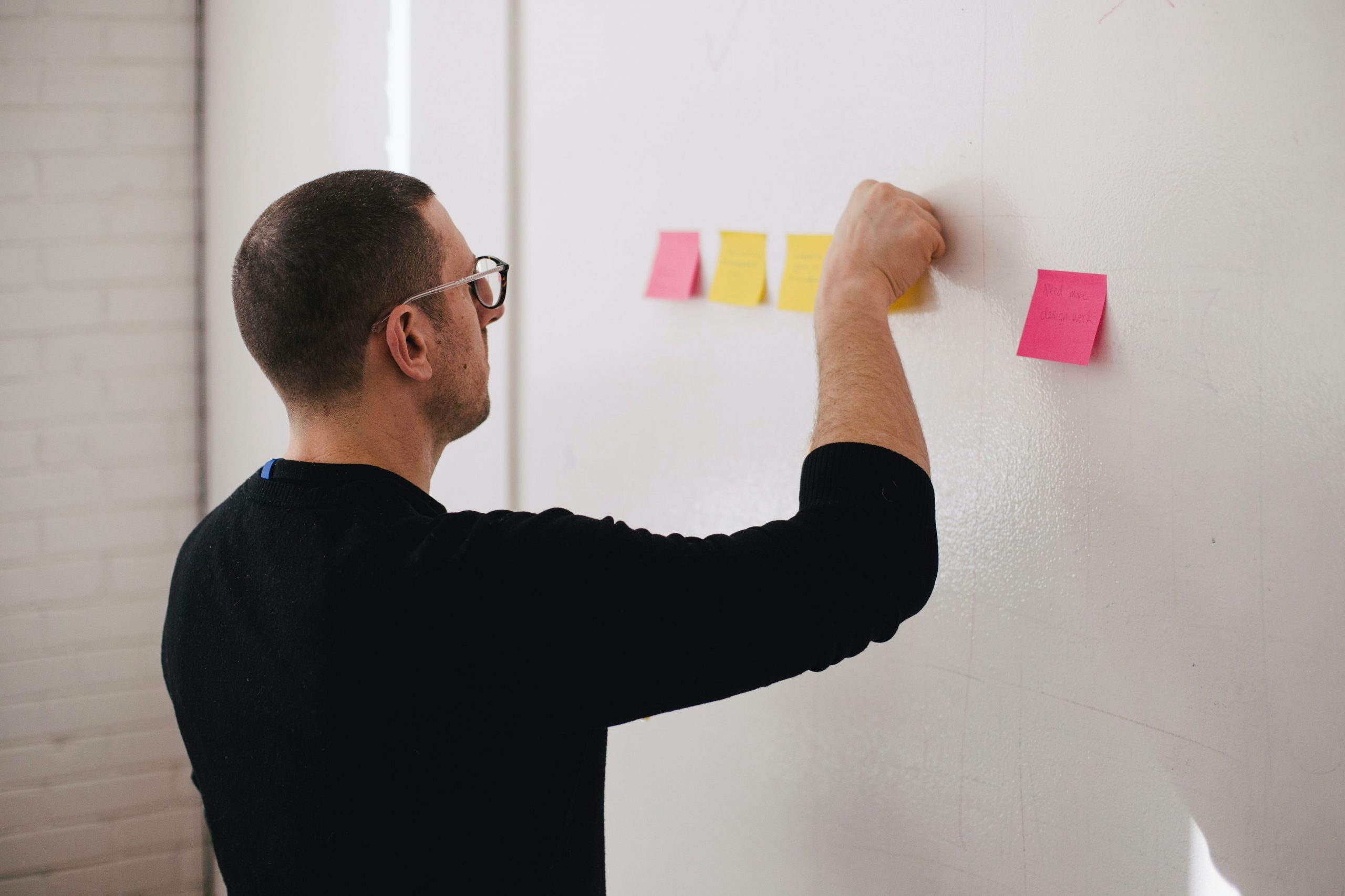 Man planning out for data visualization strategy for data storytelling